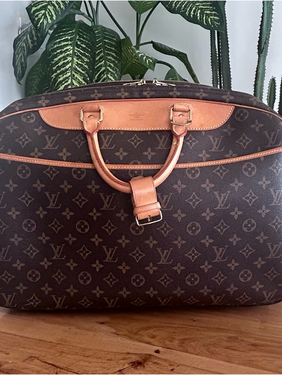 Louis Vuitton Handbags - Louis Vuitton Brown Monogram Canvas Duffel with Vachetta Leather Trim